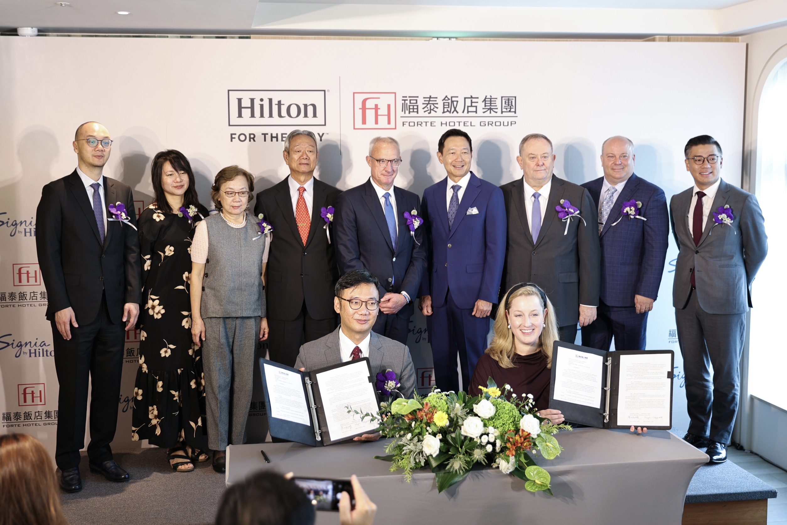 福泰飯店集團與希爾頓代表出席Signia by Hilton品牌簽約儀式，廖炳燿董事長與Meghan Fitzgerald等雙方代表合影